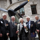Dame Vera Lynn poses with Battle of Britain Veterans for pictures in front of a Mark IV Supermarine Spitfire replica to mark the 70th Anniversary of the Battle of Britain. Photo via Getty Images.